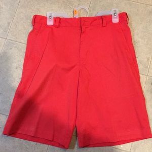 Men’s red Nike golf shorts